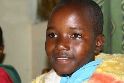 Immagine di un piccolo ospite dell'orfanotrofio "Children's home St. Patrick"