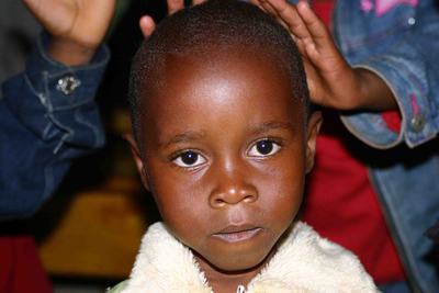 Immagine di un piccolo ospite dell'orfanotrofio "Children's home St. Patrick"